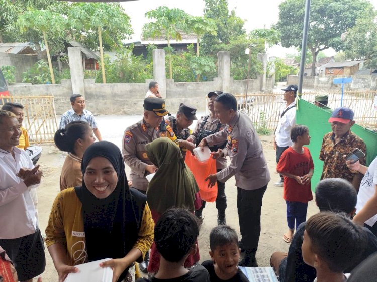 Polda Jatim Berbagi Makan Siang Gratis, Apresiasi Warga Situbondo yang Sudah Nyoblos di TPS